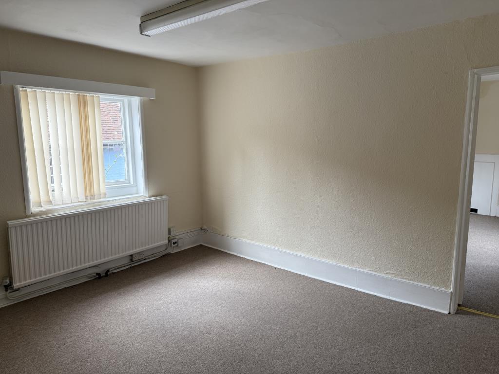 Lot: 83 - FREEHOLD TOWN CENTRE COMMERCIAL INVESTMENT AND UPPER FLOORS WITH POTENTIAL - A room on the First Floor at the Rear of the Building
